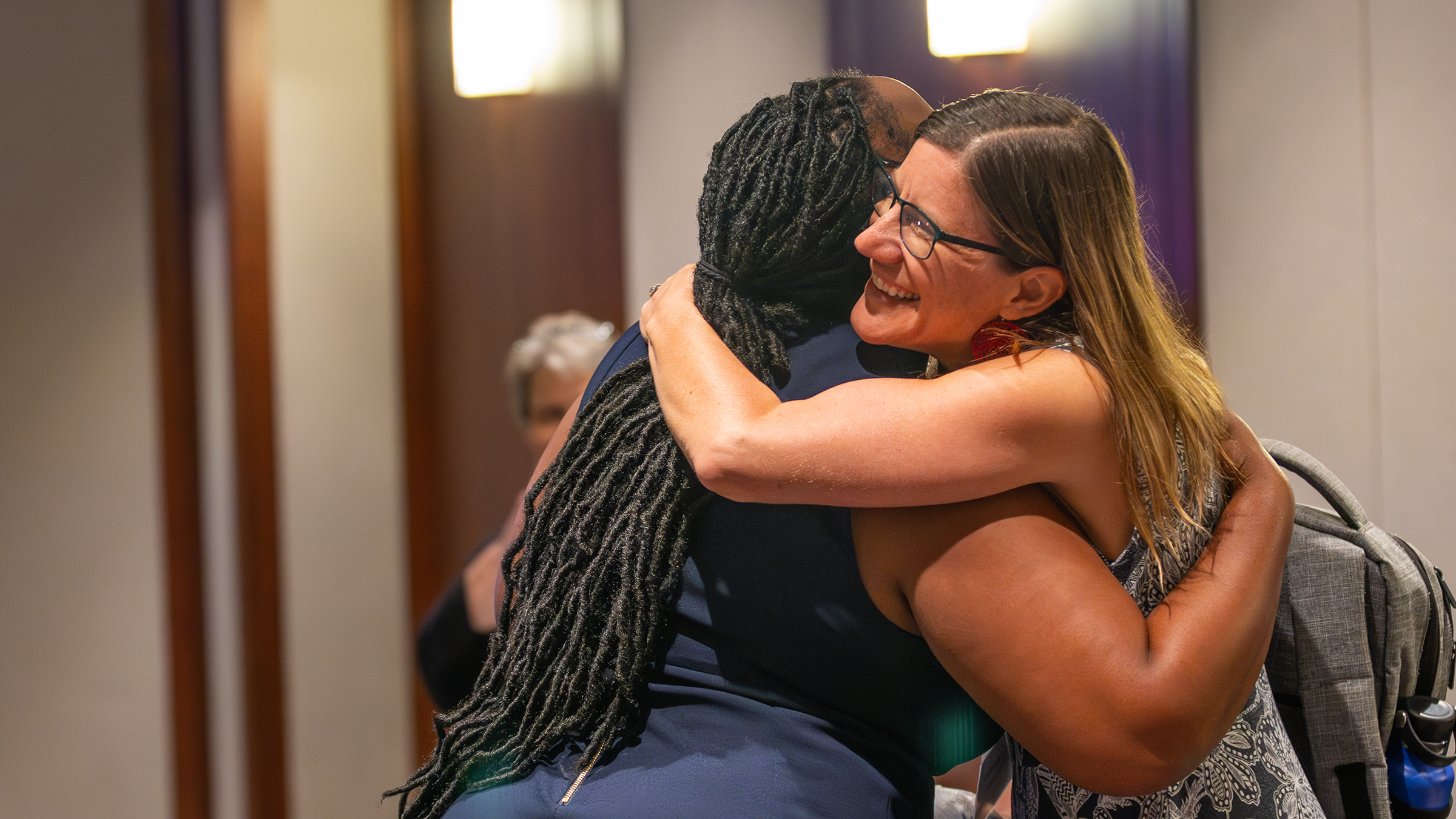 Two people hug at the 2023 event
