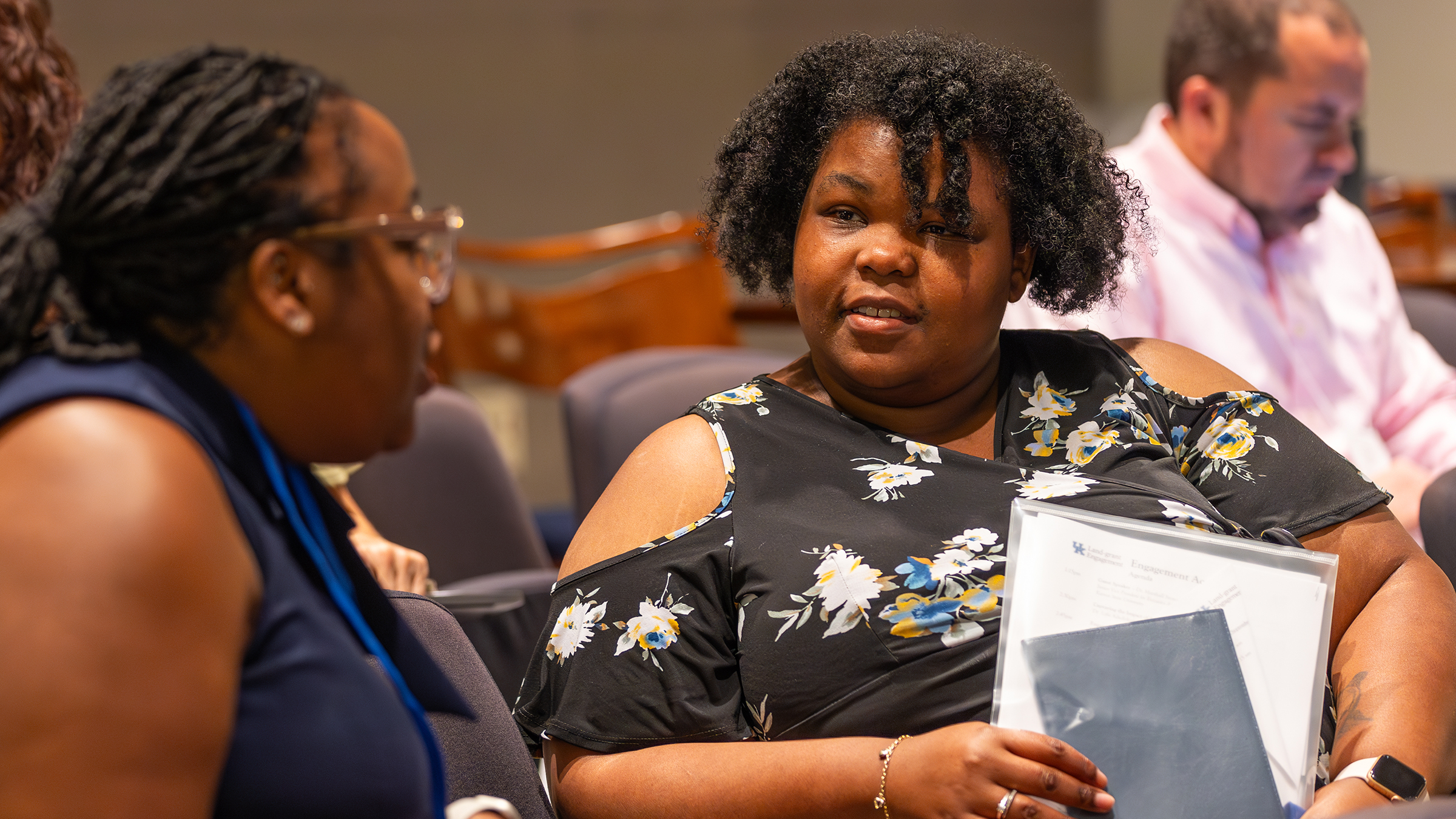 Two participants talk at the 2023 event
