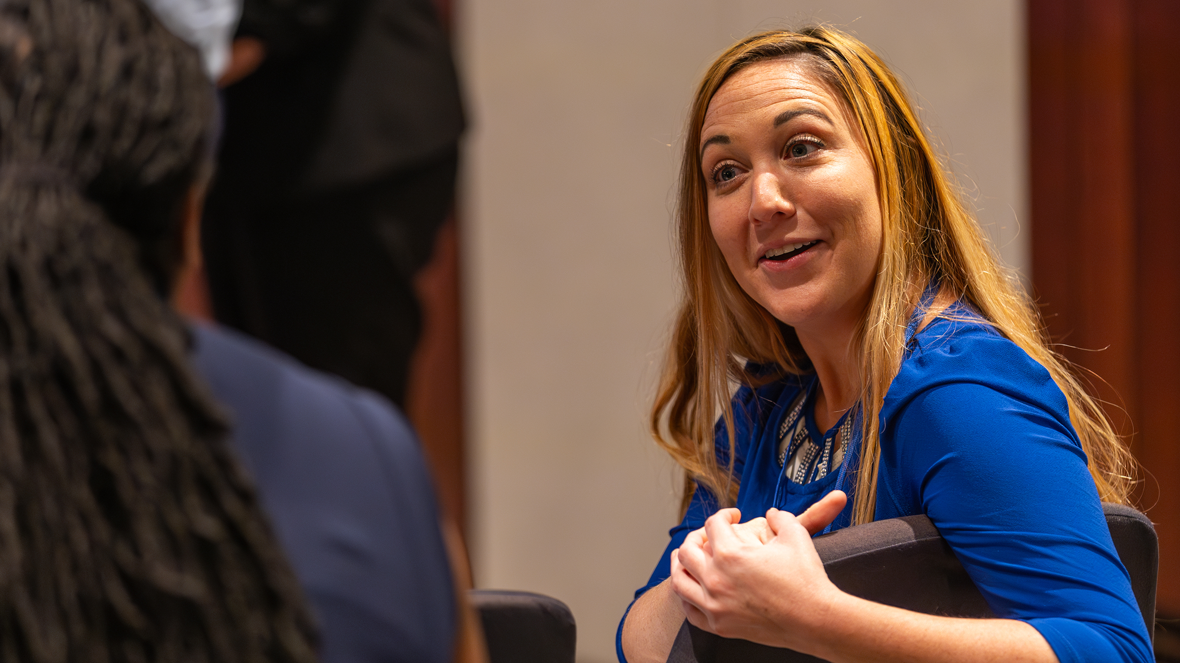 Two people talk at the 2023 event