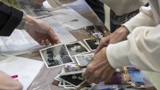People learn how to care for photos after a weather event