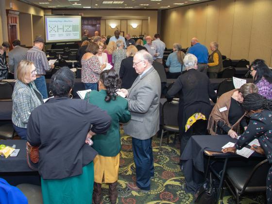 Members of the Kentucky State Extension Advisory Council complete a group activity.